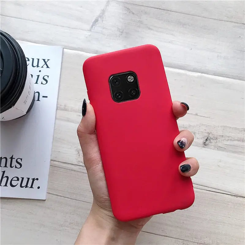 the red case is held up against the camera
