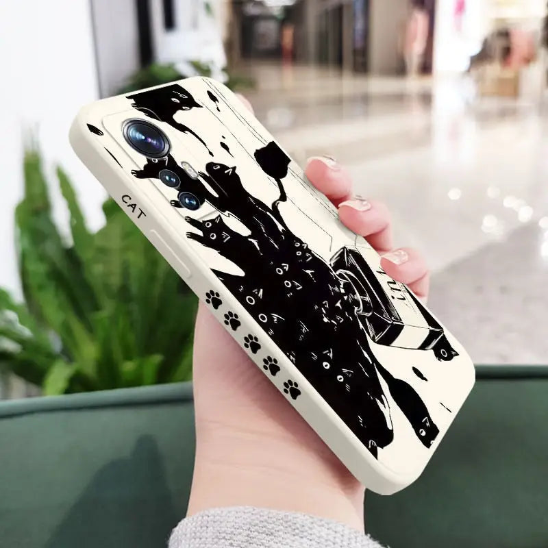 a woman with a cat phone case