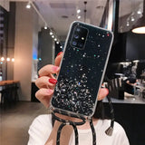 a woman holding up a phone case with a starr pattern