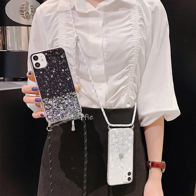 a woman holding a phone case with a silver glitter phone