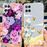 a woman holding a phone case with flowers and butterflies