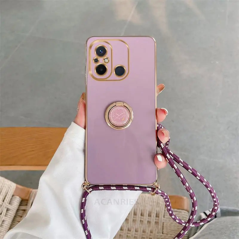 a woman holding a phone case with a purple phone