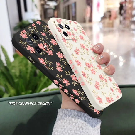 a woman holding a phone case with flowers on it