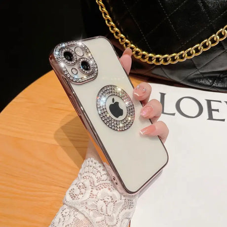 a woman holding a phone case with a ring on it