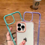 a woman holding a phone case with a phone in it