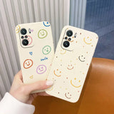 a person holding a phone case with smiley faces