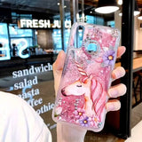 a person holding a phone case with a unicorn