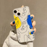 a person holding a phone case with a drawing of a man