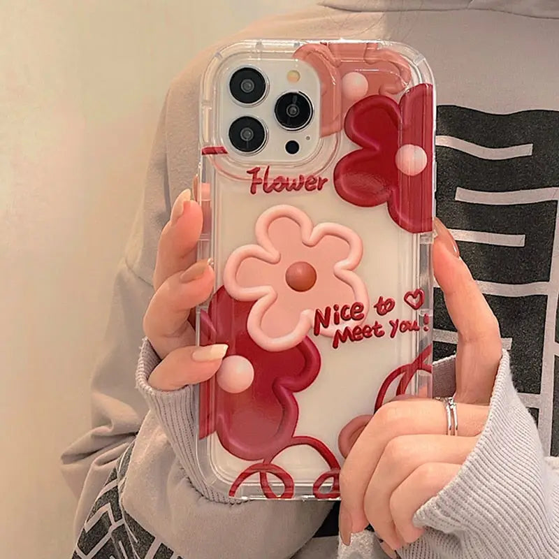 a woman holding a phone case with minnie mouse ears