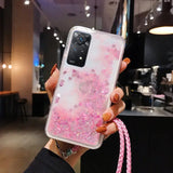 a woman holding a pink phone case with glitter