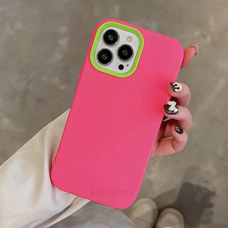 a woman holding a pink iphone case