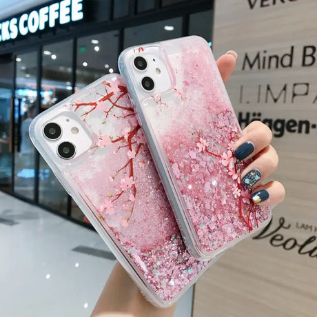 a woman holding a pink marble phone case