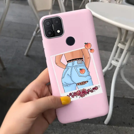 a woman holding a pink phone case with a picture of her face