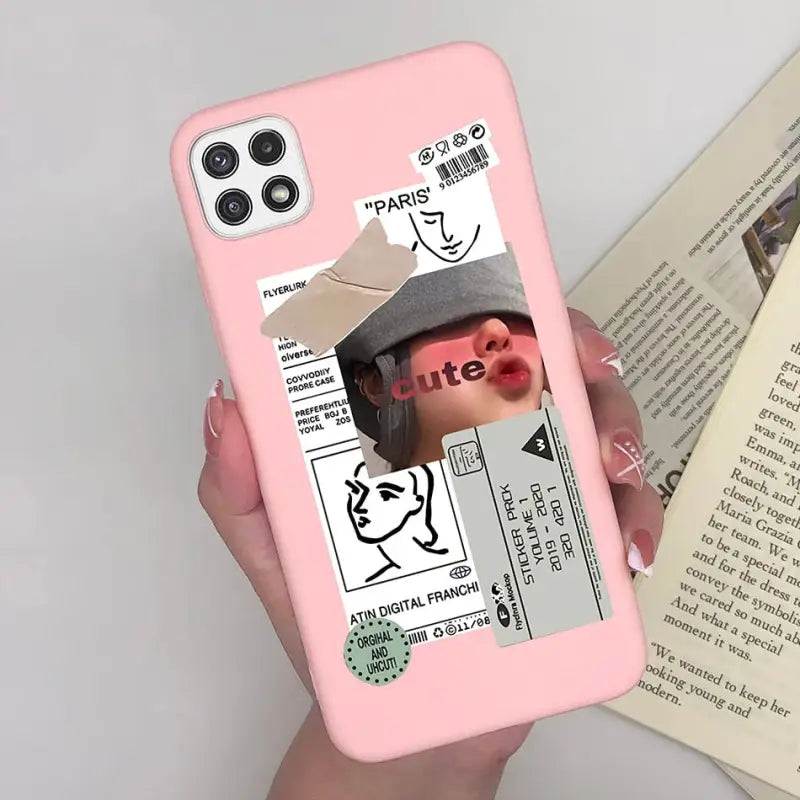 a person holding a pink phone case with a picture of a woman
