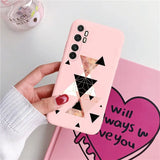 a pink phone case with a heart and a black and white geometric design