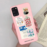 a woman holding a pink phone case with a picture of a woman and a book