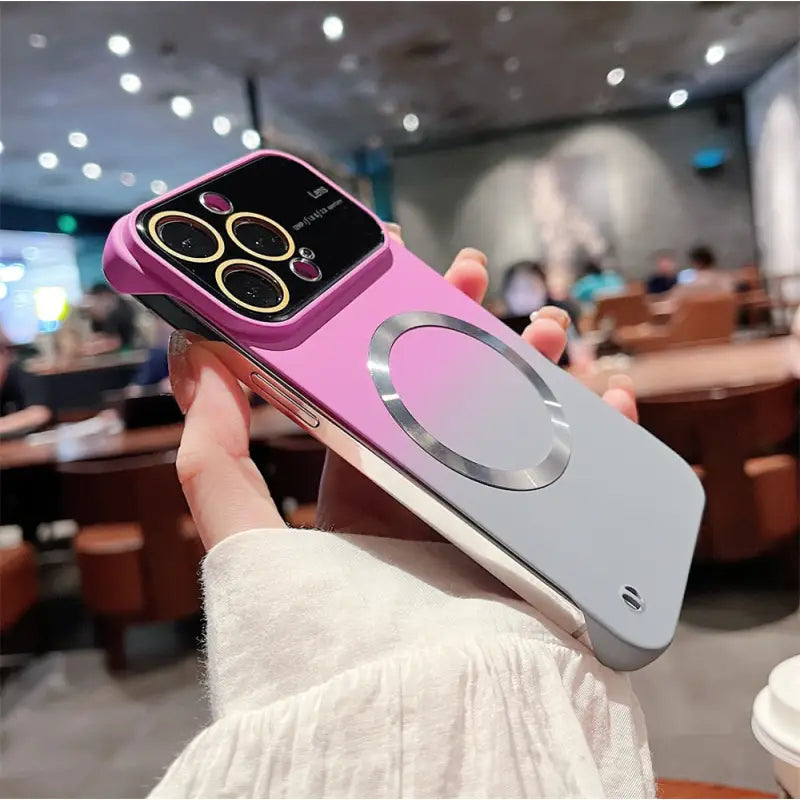 a woman holding a pink phone case with a phone holder
