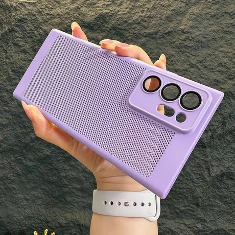 a woman holding a purple case with a phone in her hand