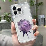 a woman holding a purple flower phone case