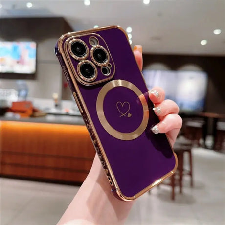 a person holding a purple iphone case