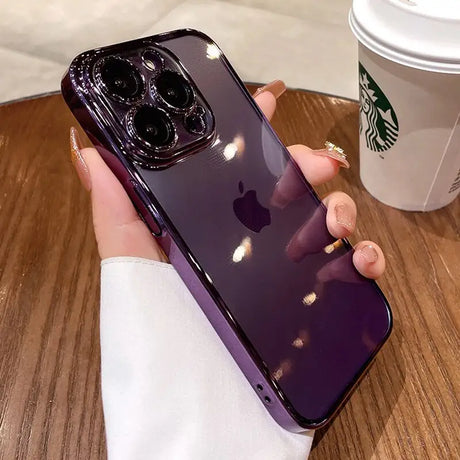 a woman holding a purple iphone case