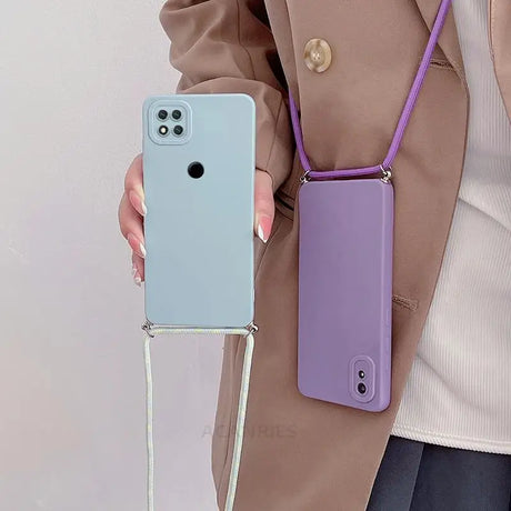 a woman holding a purple phone case