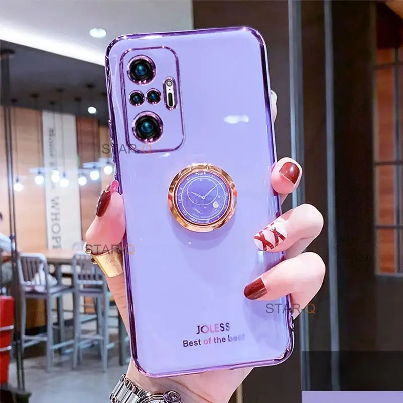 a woman holding a purple phone case with a watch on it
