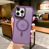 a woman holding a purple phone case