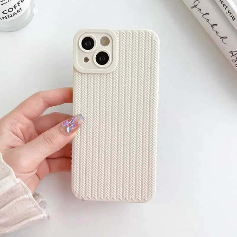 the iphone case is made from a knit pattern