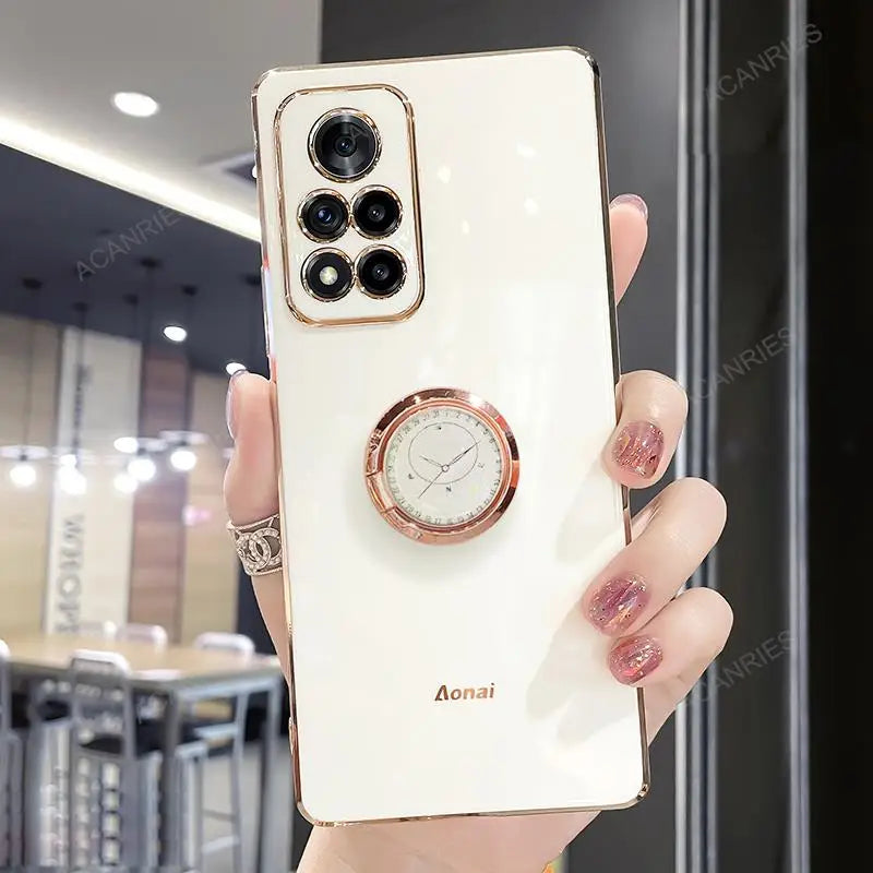 a woman holding a white phone case with a watch on it