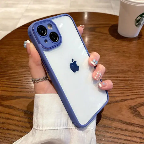 A woman holding an iphone case with a blue iphone