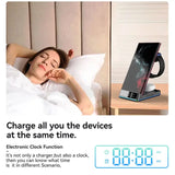 a woman laying in bed with a phone