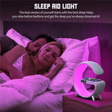 a woman laying in bed with a pink light on her face