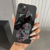 A woman holding a phone case with a bird on it