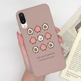 a woman holding a phone case with a bird design