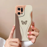 a woman holding a phone case with a butterfly on it