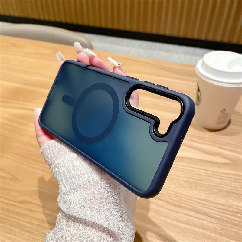 a woman holding a phone case with a camera lens