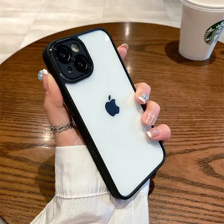 A woman holding a phone case with a camera