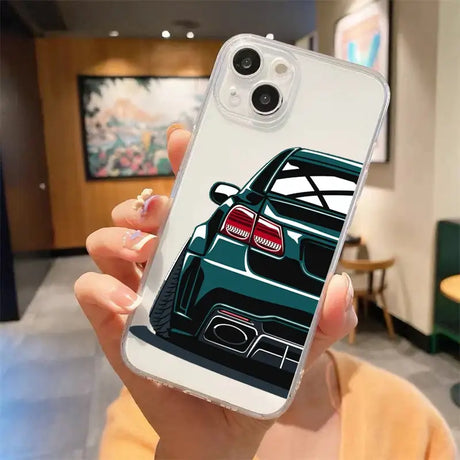 A woman holding a phone case with a car on it