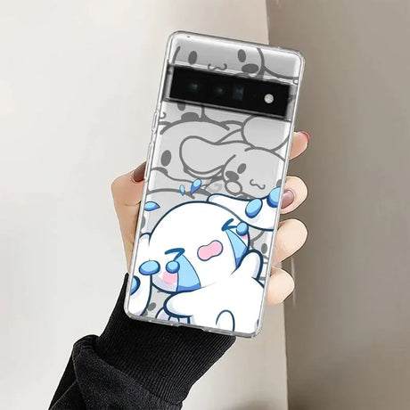 A woman holding a phone case with a cartoon character on it