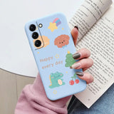 a woman holding a phone case with a cartoon design