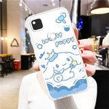 A woman holding up a phone case with a cartoon character