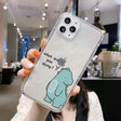 a woman holding up a phone case with a cartoon character on it