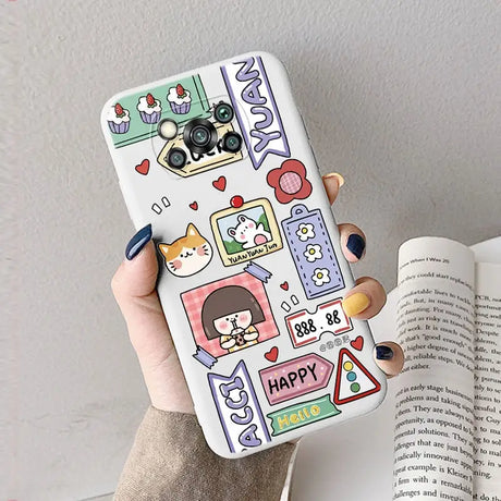 a woman holding a phone case with cartoon characters on it