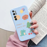 a woman holding a phone case with a cartoon design