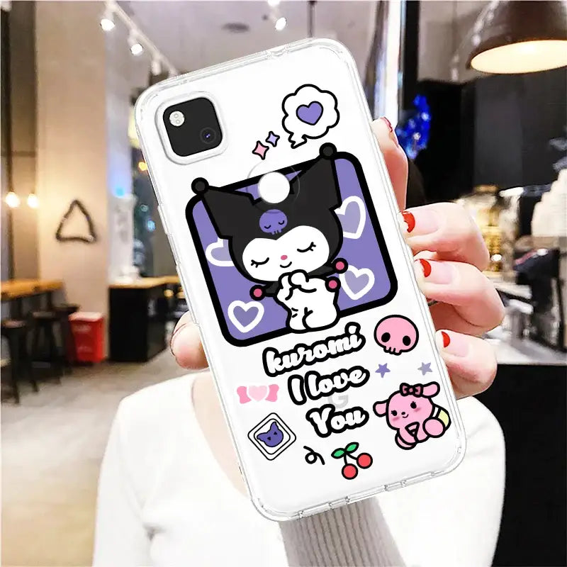 a woman holding a phone case with a cat and dog on it