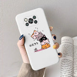 a woman holding a phone case with a cat and dog on it