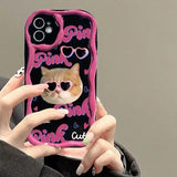 A woman holding a phone case with a cat on it