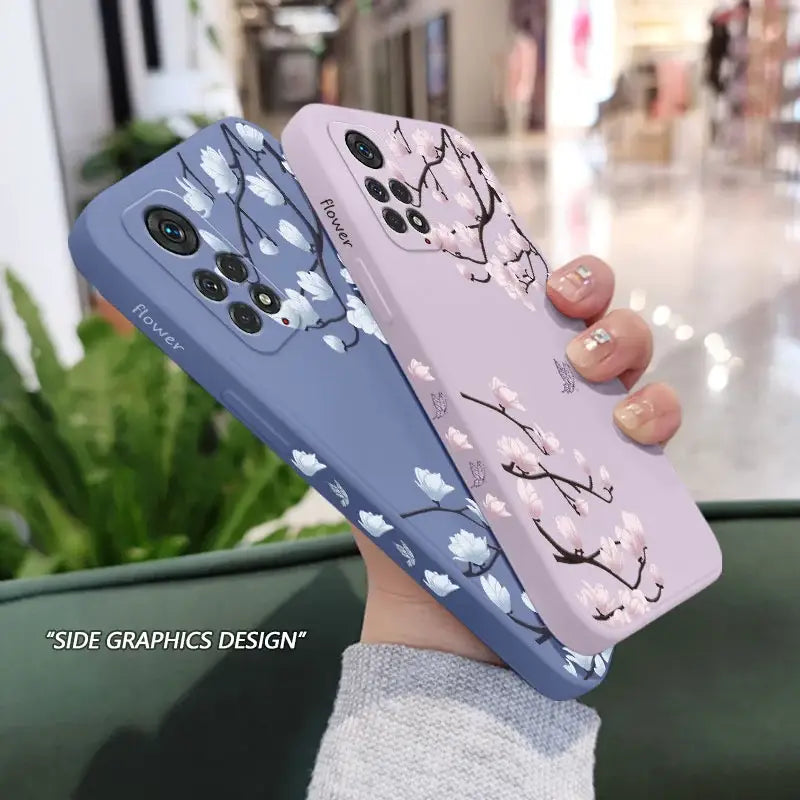 a woman holding a phone case with a cat design