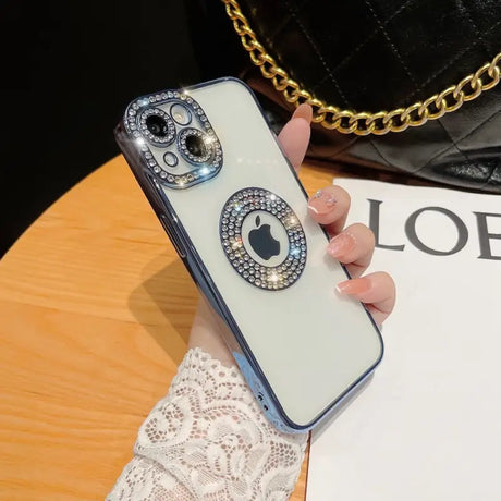 a woman holding a phone case with a chain around it
